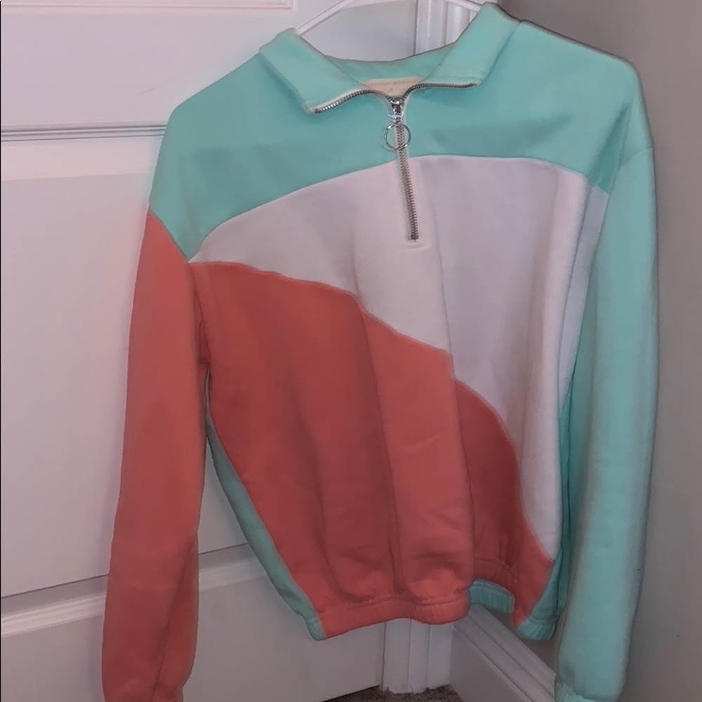 A crew neck sweater